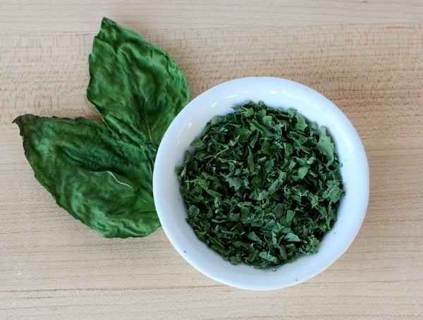 Bowl of dried basil.