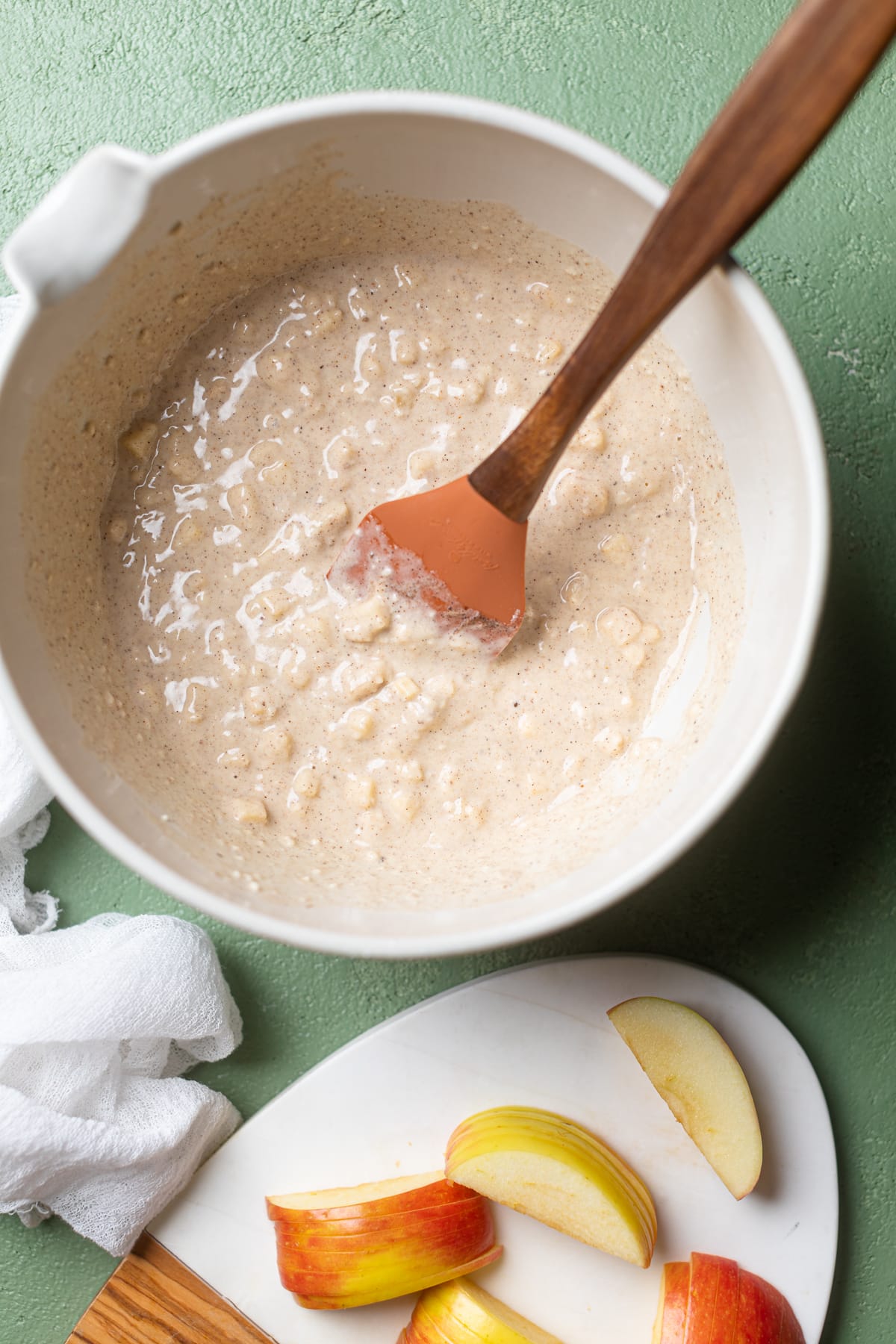 Spatula in a bowl of Vegan Apple Cinnamon Pancake batter