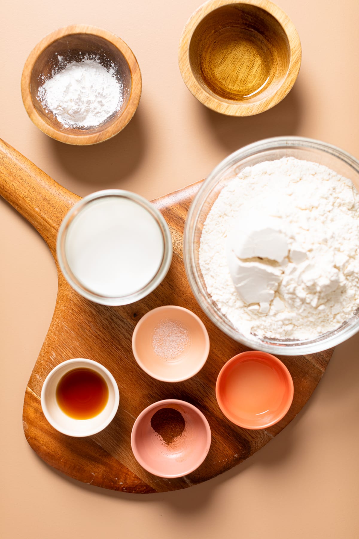 Bowls of ingredients including flour, cinnamon, and salt.