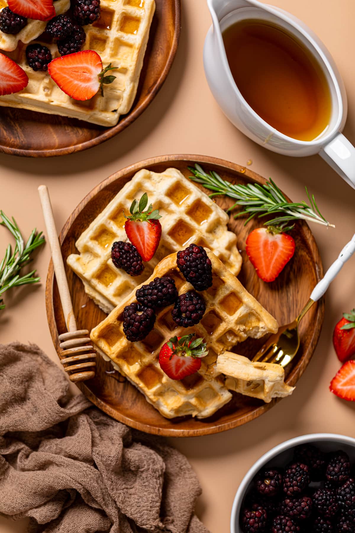 Fork grabbing a piece of Fluffy Cinnamon Vegan Belgian Waffle.