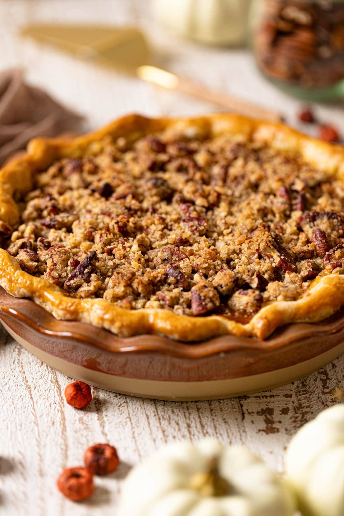 Vegan Maple Pumpkin Pie in a brown pie pan