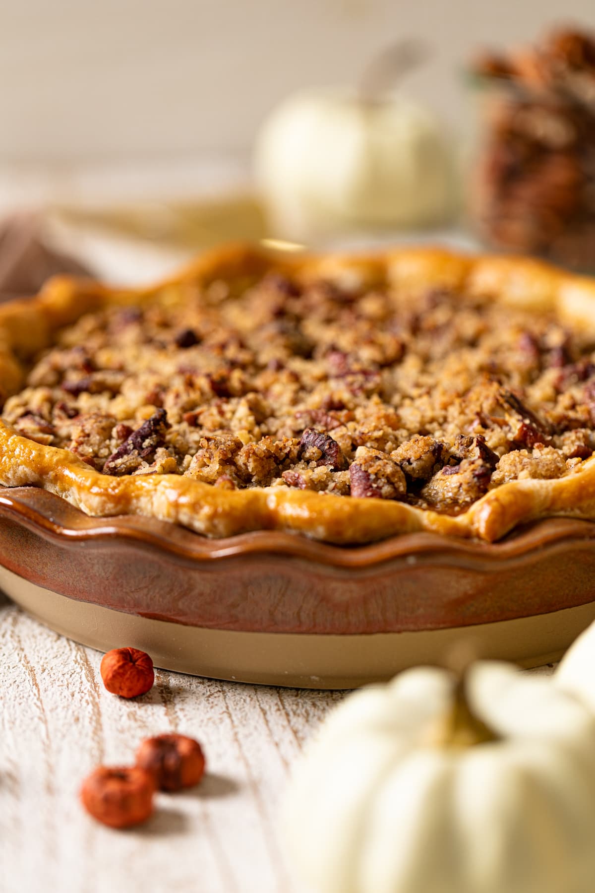 Vegan Maple Pumpkin Pie in a brown pie pan