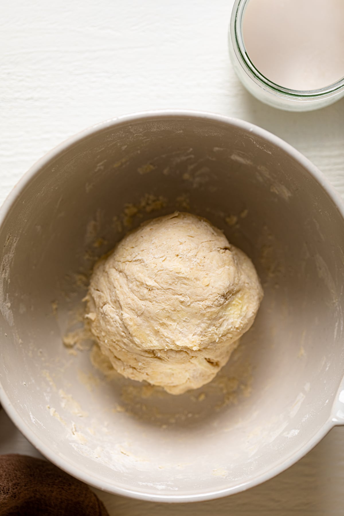 Ball of pie crust dough in a bowl