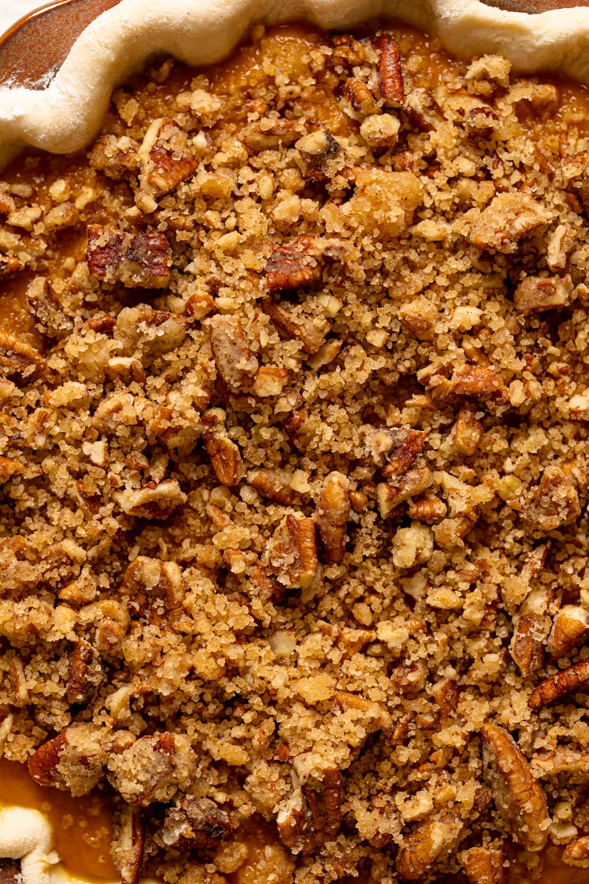 Closeup of crumble topping on a Vegan Maple Pumpkin Pie