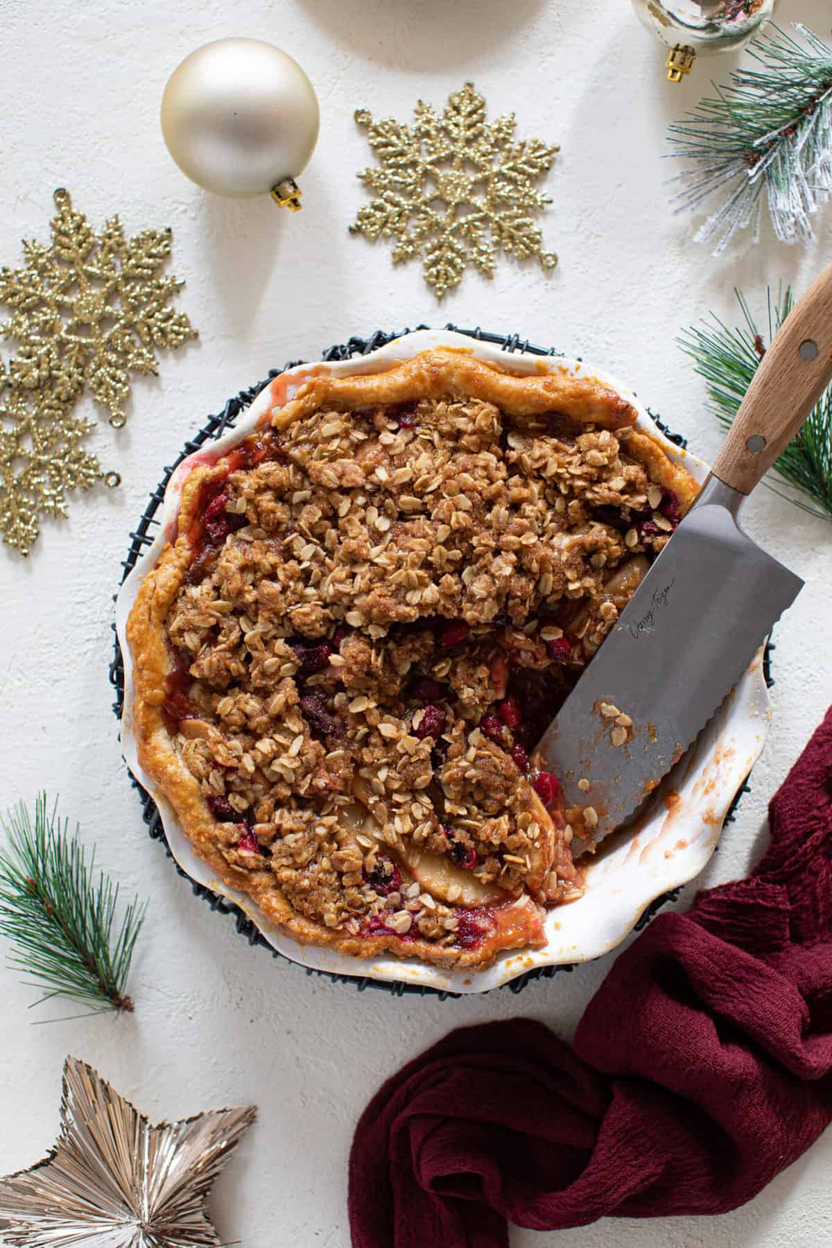 Overhead shot of Crumble being served with a knife