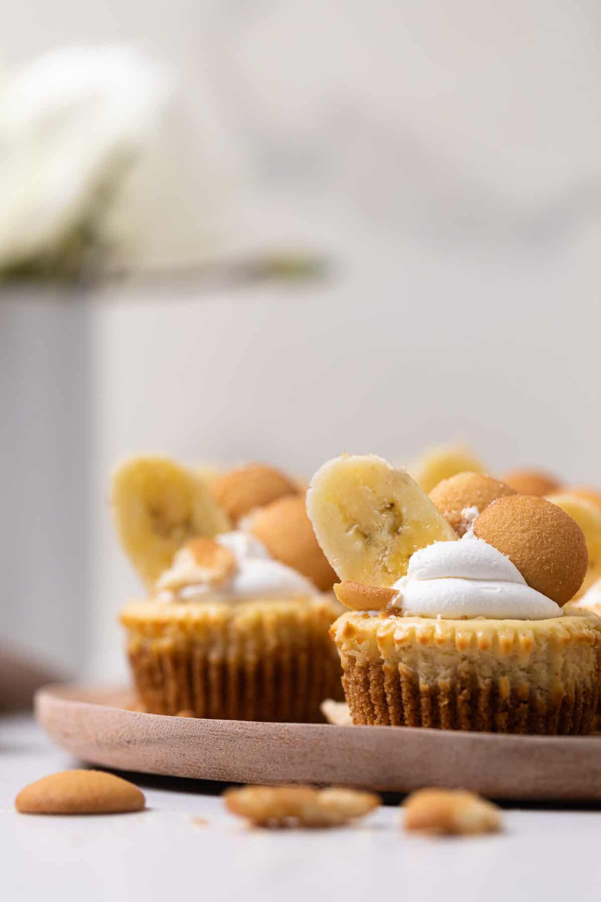 Banana Pudding Cheesecake Bites topped with banana slices and vanilla wafers.