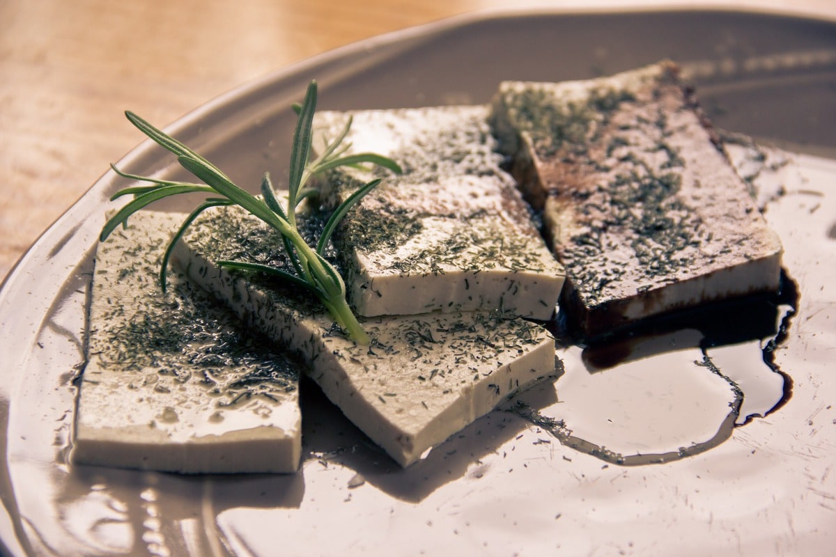 Seasoned tofu on a plate.