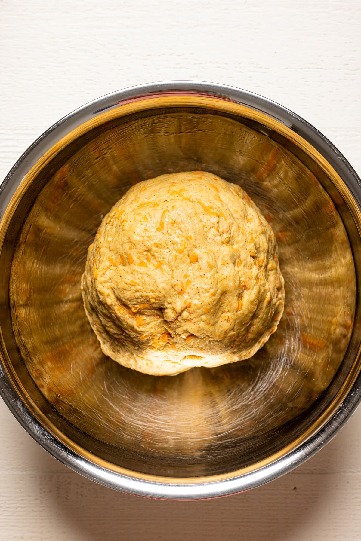 Southern-Style Carrot Cake Cinnamon Roll dough in a bowl