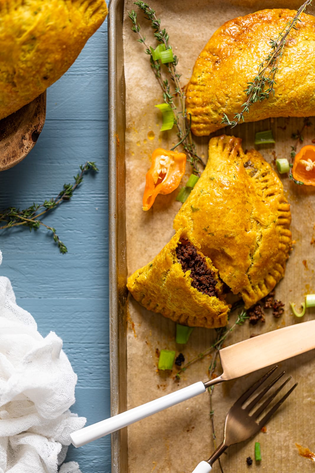 Closeup of a Spicy Jamaican Beef Patty that has been broken in half