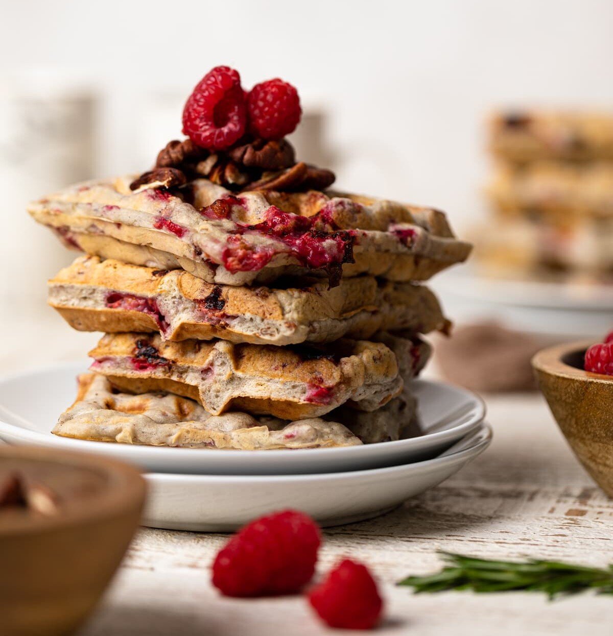 Stack of Raspberry Pecan Vegan Waffles on two small, stacked plates