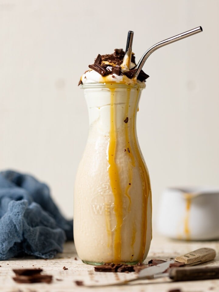 Salted Caramel Chunky Milkshake with caramel dripping down the sides