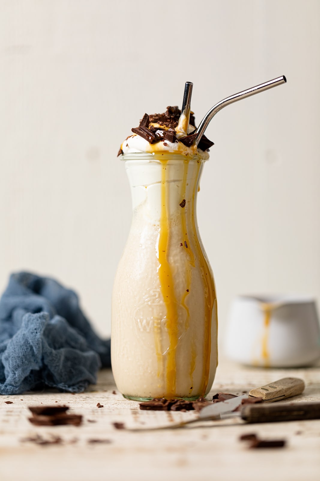 Salted Caramel Chunky Milkshake with caramel dripping down the sides