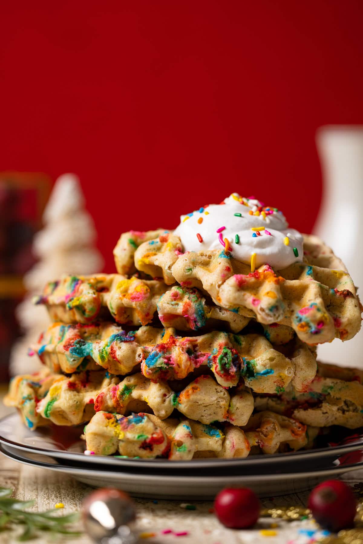 Leaning stack of Funfetti Oatmeal Vegan Waffles