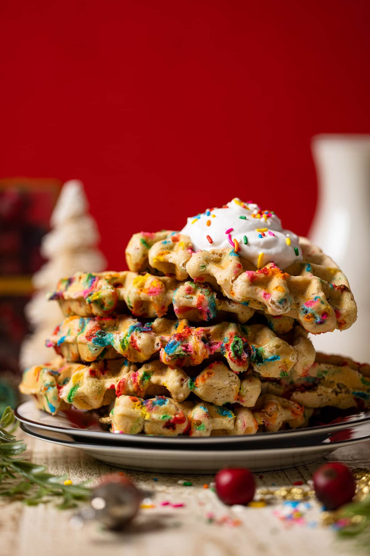 Leaning stack of Funfetti Oatmeal Vegan Waffles