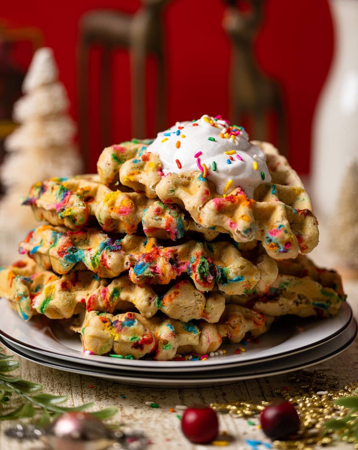 Closeup of a stack of Funfetti Oatmeal Vegan Waffles