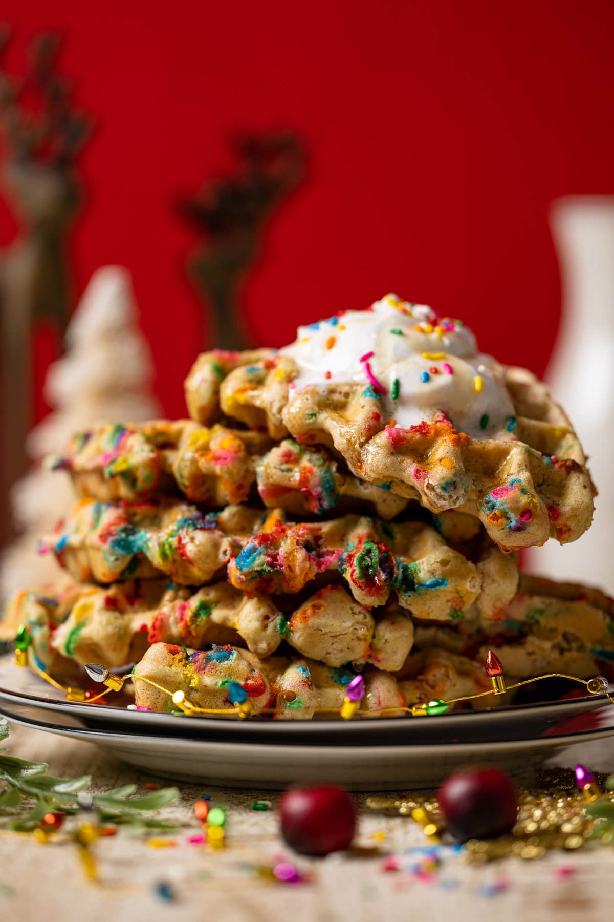 Closeup of a stack of Funfetti Oatmeal Vegan Waffles