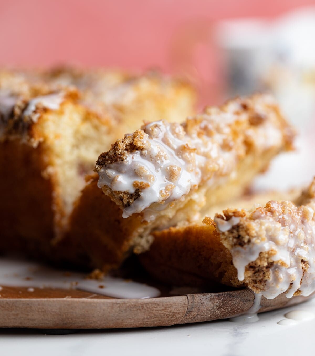 Leaning slices of Breakfast Lemon Raspberry Coffee Cake.