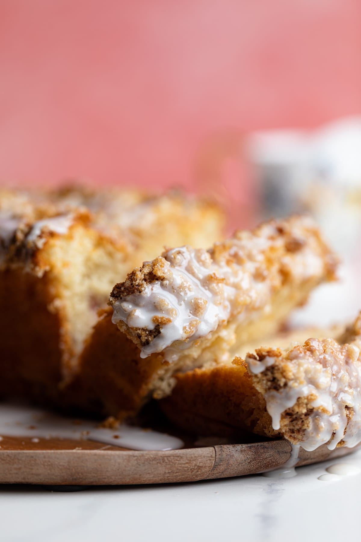 Leaning slices of Breakfast Lemon Raspberry Coffee Cake.