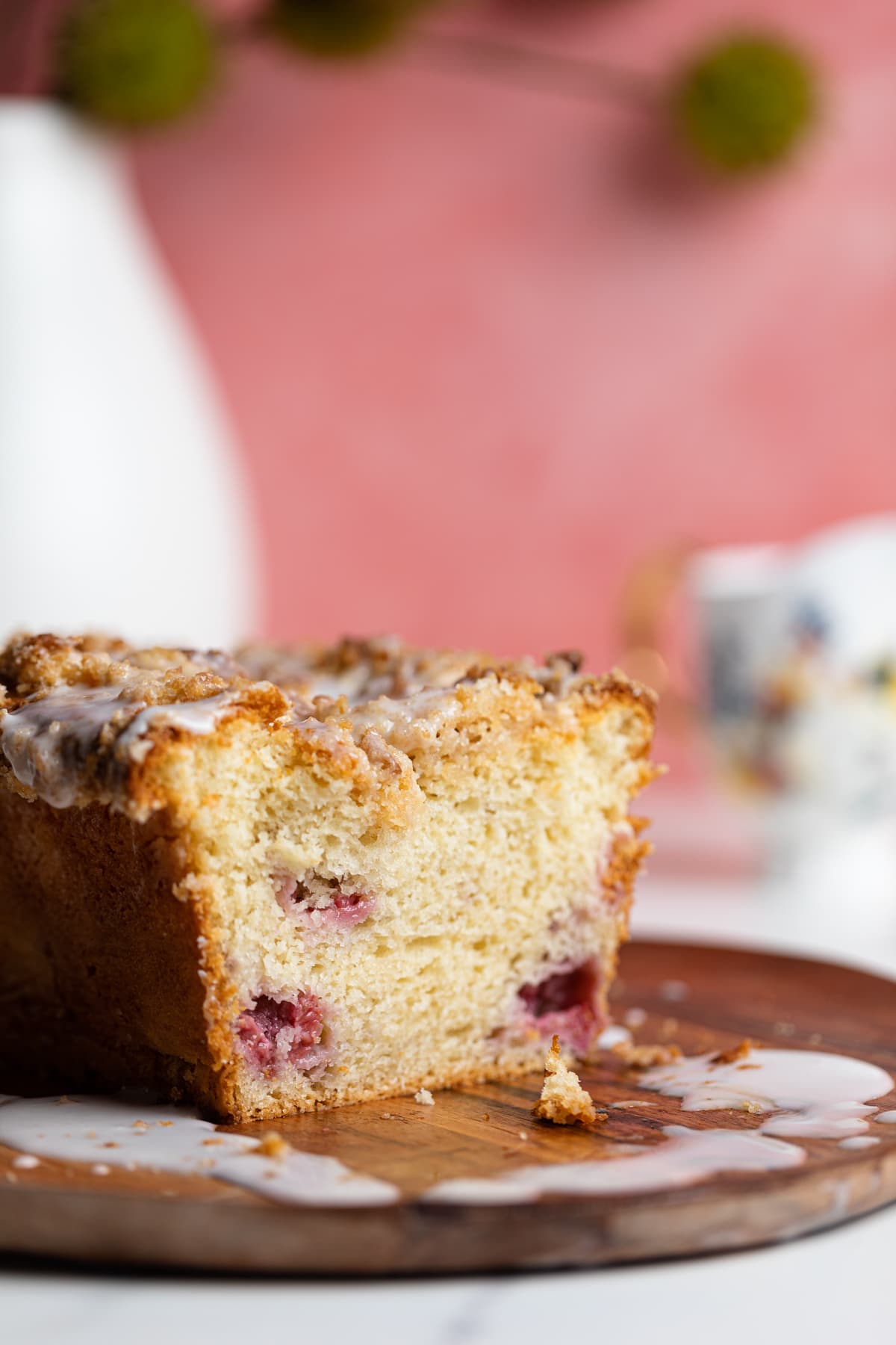 Breakfast Lemon Raspberry Coffee Cake on a wooden board.