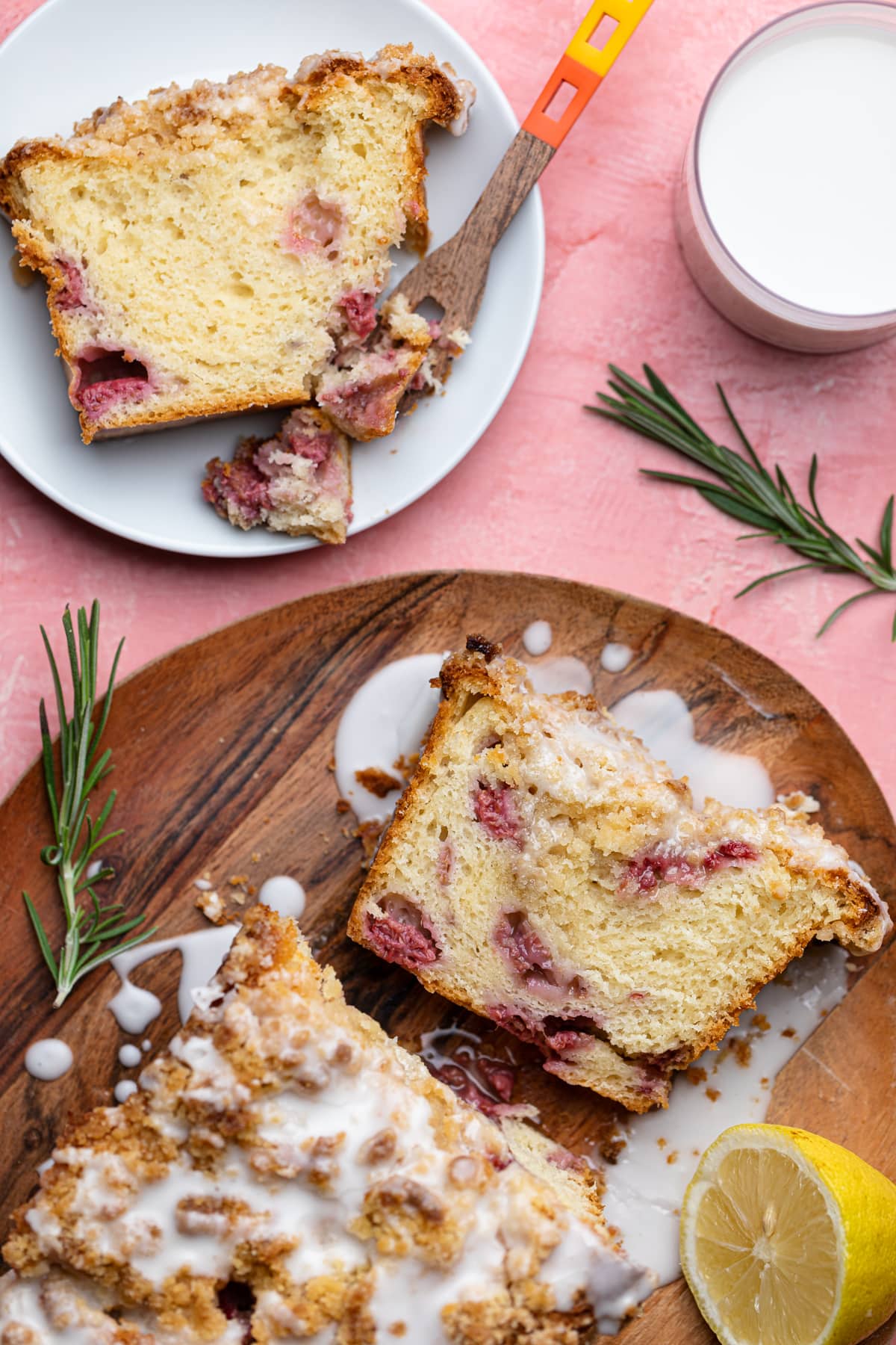 Breakfast Lemon Raspberry Coffee Cake on a board and a plate.