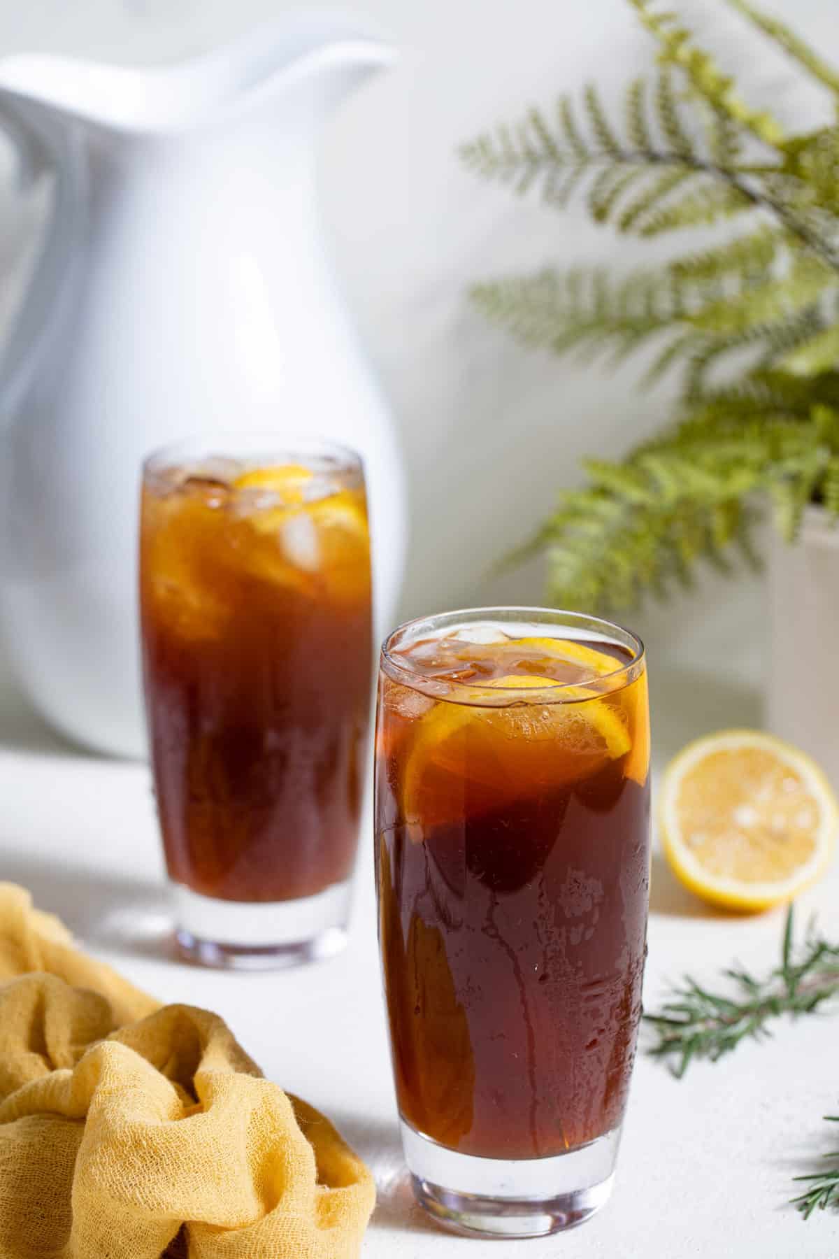 Two tall glasses of Traditional Southern Iced Sweet Tea.