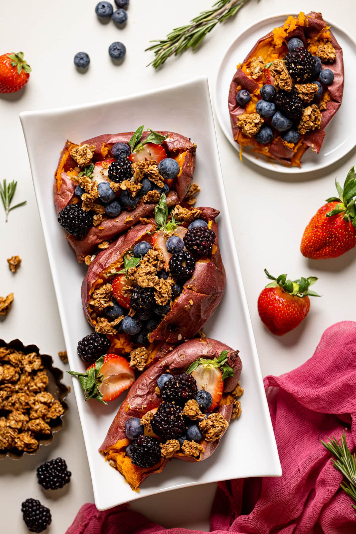 Plate with three Sweet Potato Berry Breakfast Boats