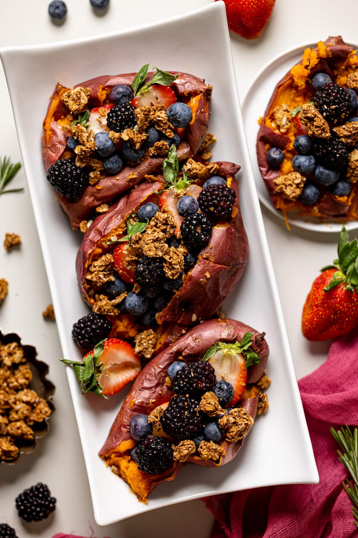 Plate with three Sweet Potato Berry Breakfast Boats