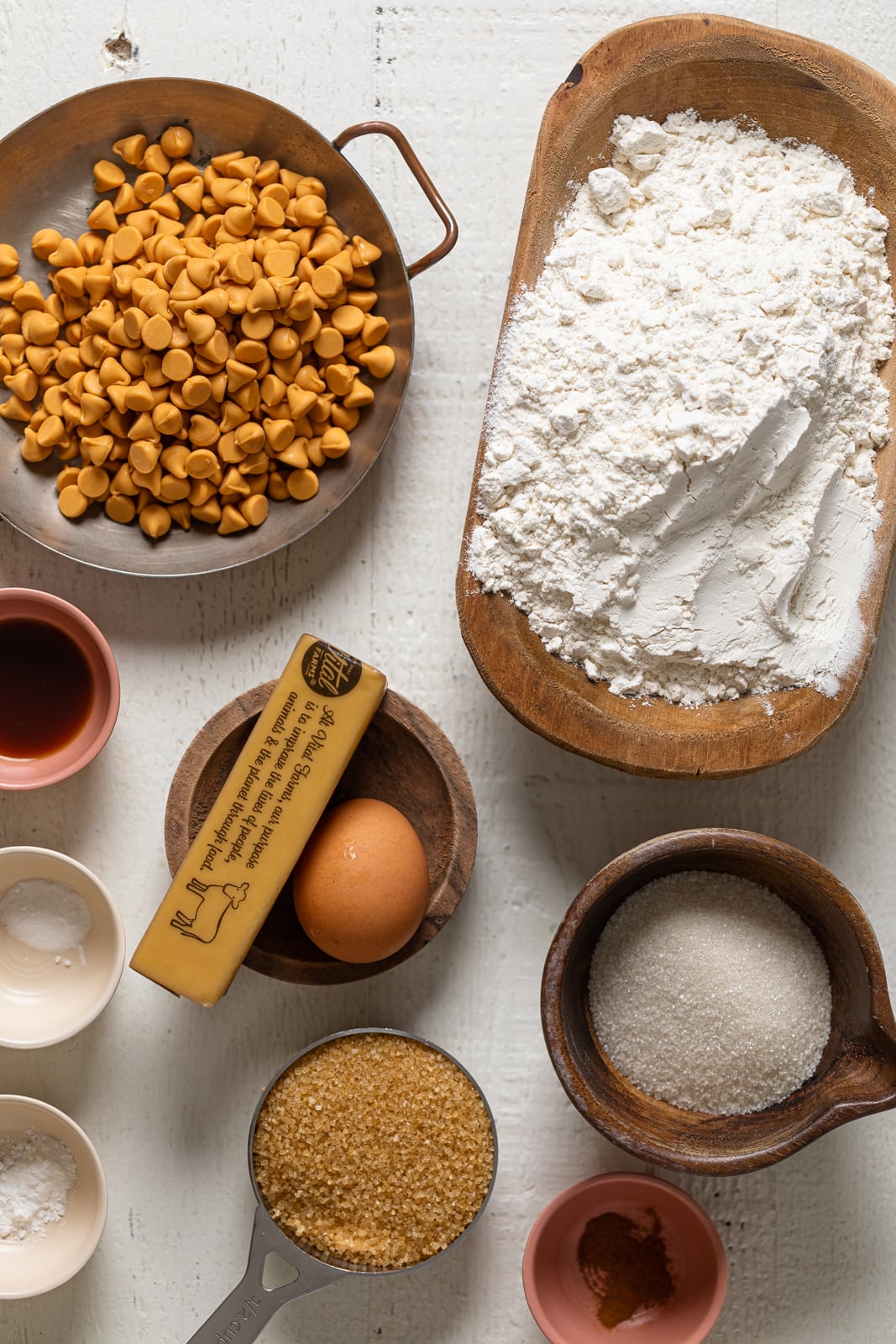 Ingredients for Crinkled Chocolate Chip Butterscotch Cookies including eggs,  butter, and flour