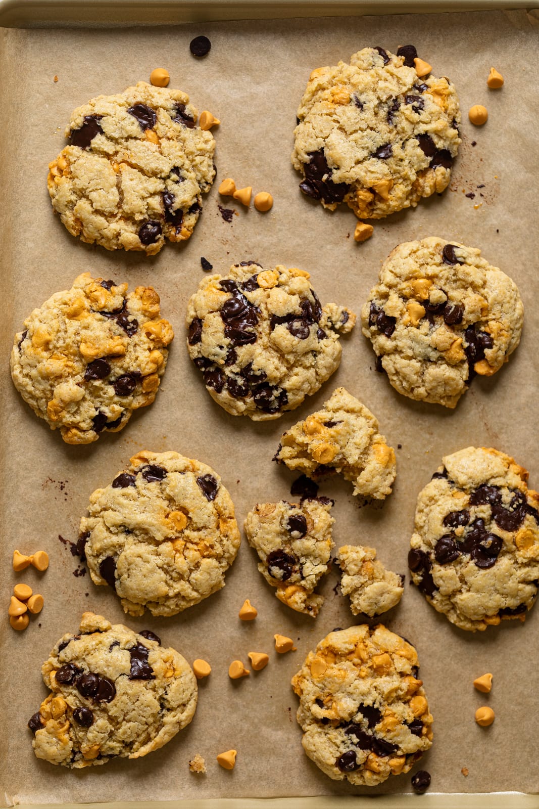 Overhead shot of Crinkled Chocolate Chip Butterscotch Cookies on parchment paper