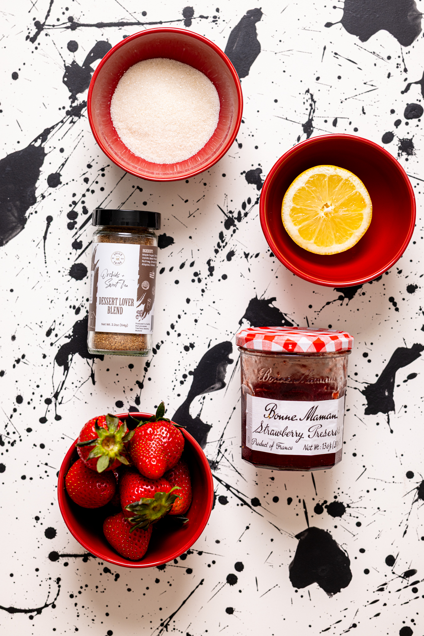 Ingredients on a black and white table.