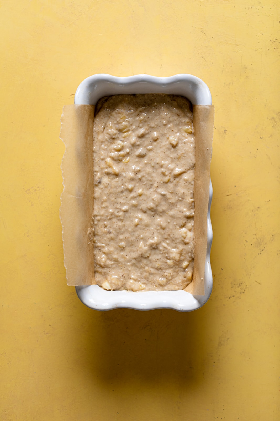 Bread pan with Vegan Cinnamon Crunch Banana Bread dough