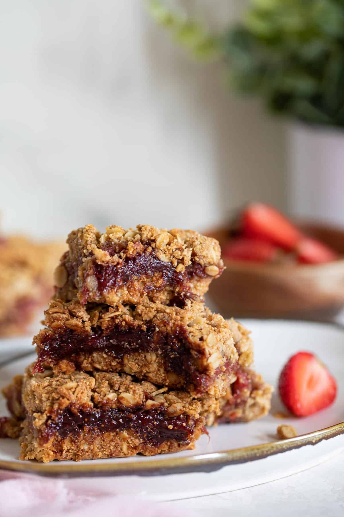 Stack of Vegan Strawberry Peanut Butter Oatmeal Bars.