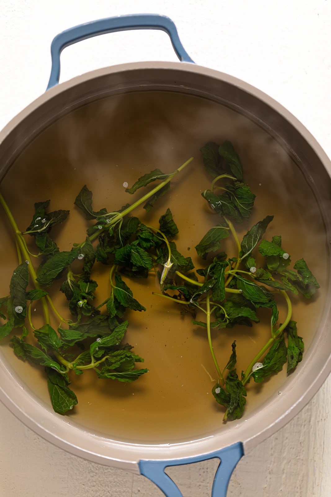 Mint steeping in a pot.