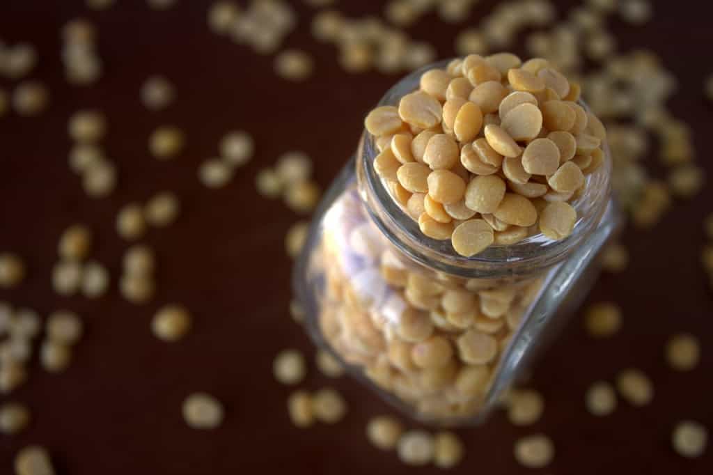 Overflowing jar of lentils.