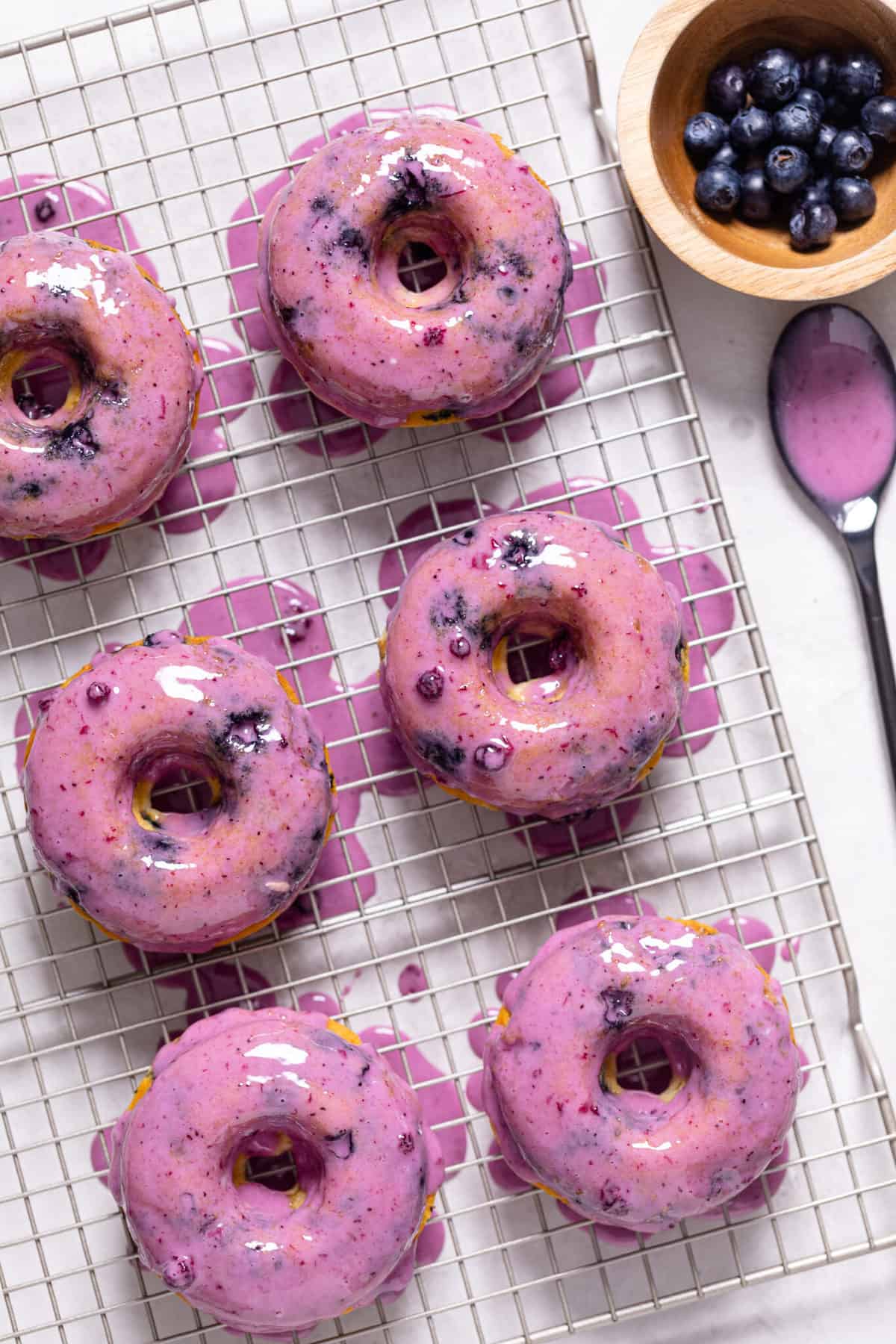 Blueberry glaze on Blueberry Vegan Donuts.
