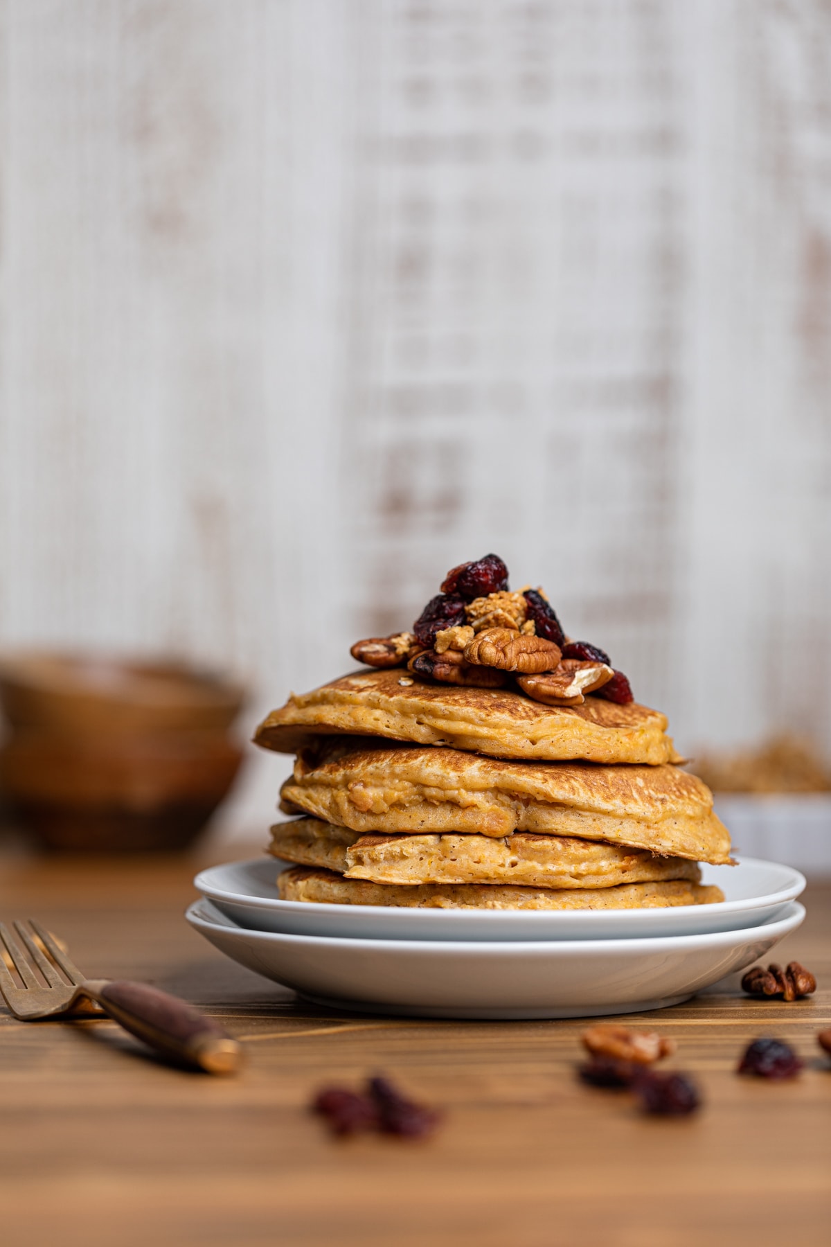 Sweet Potato Pancakes on stacked plates.