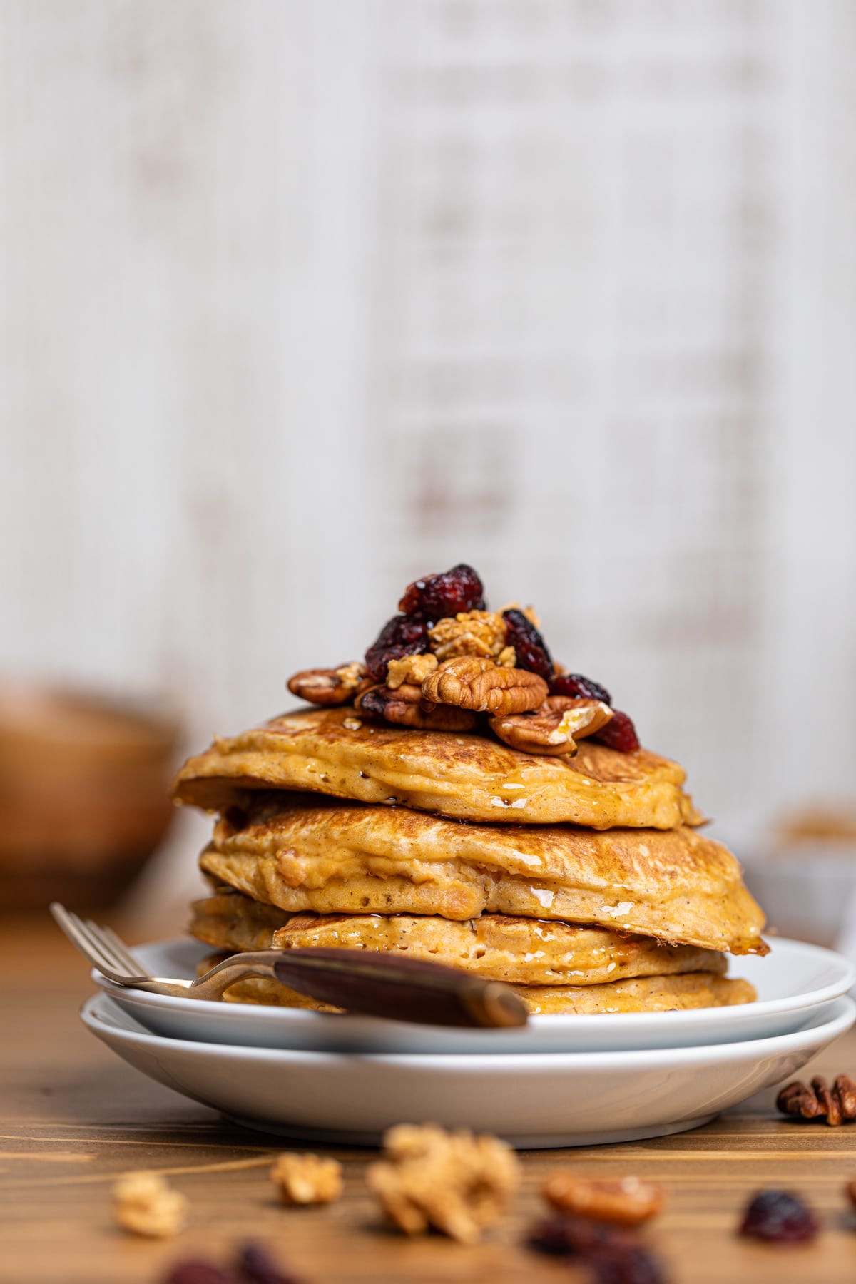 Sweet Potato Pancakes on a plate with a fork.