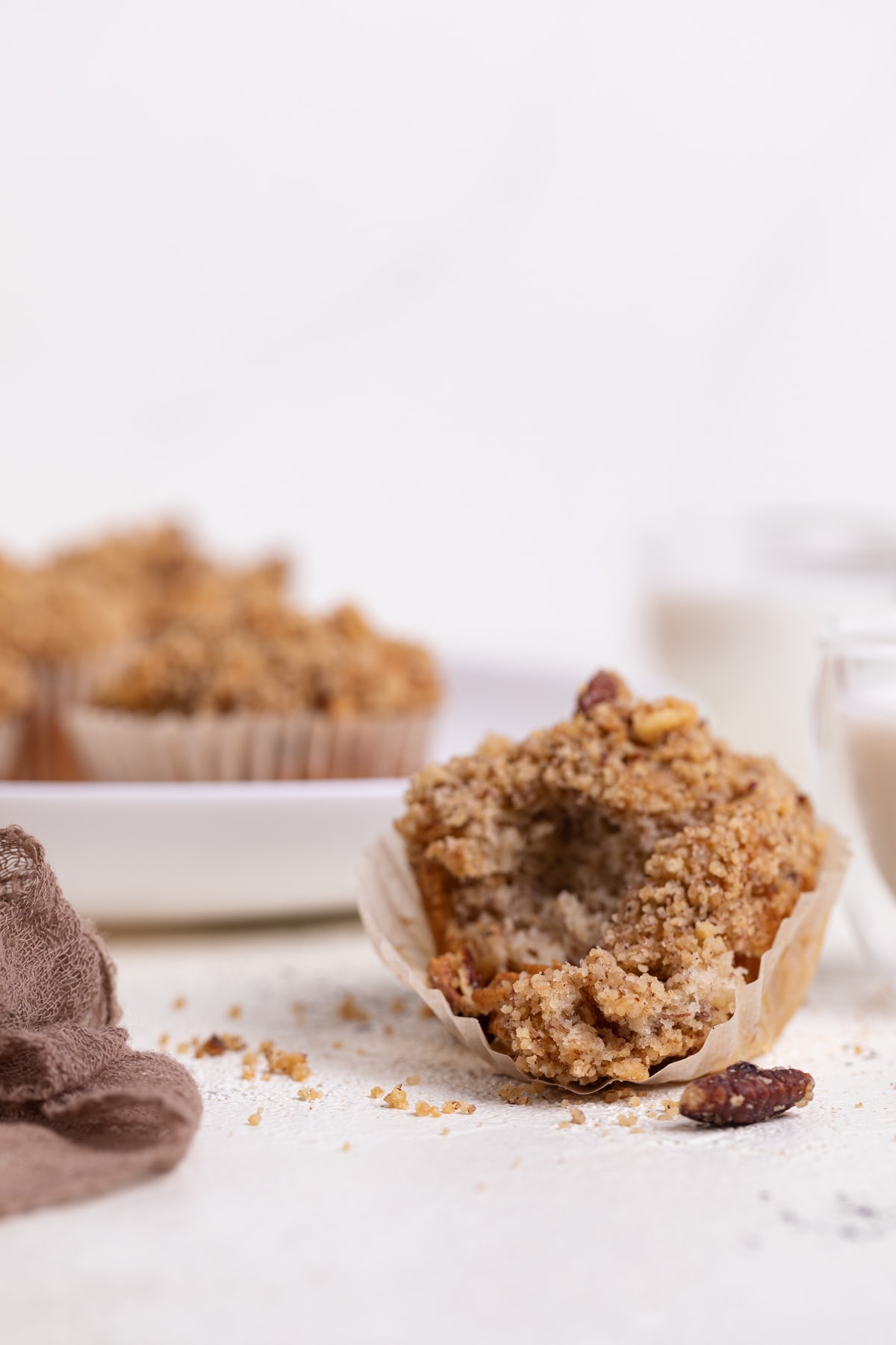 Vegan Banana Muffin with cinnamon streusel with a bite removed