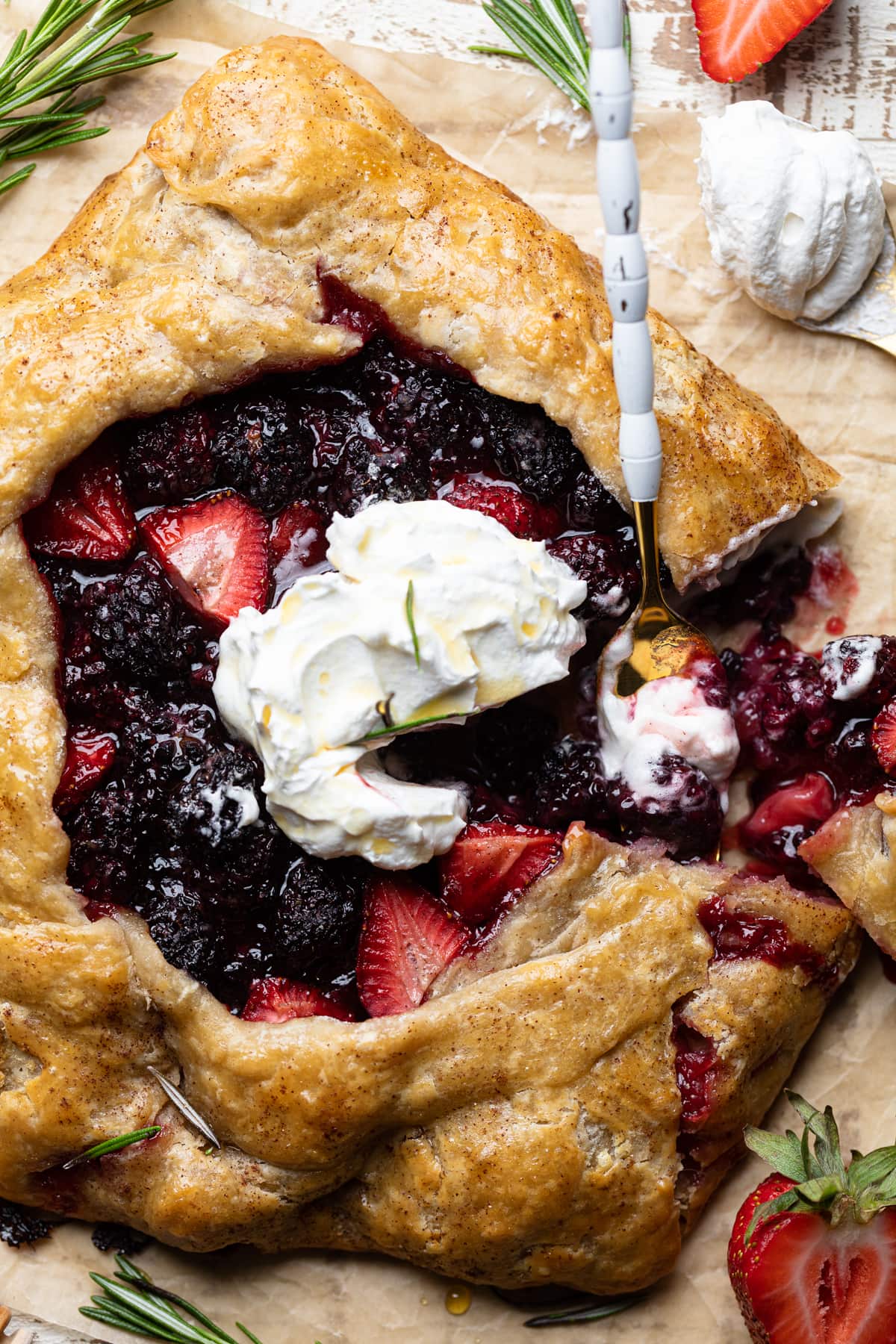 Fork digging into a Vegan Berry Galette.