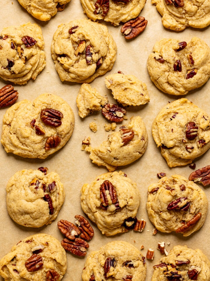 Baked cookies on a baking sheet with parchment paper.