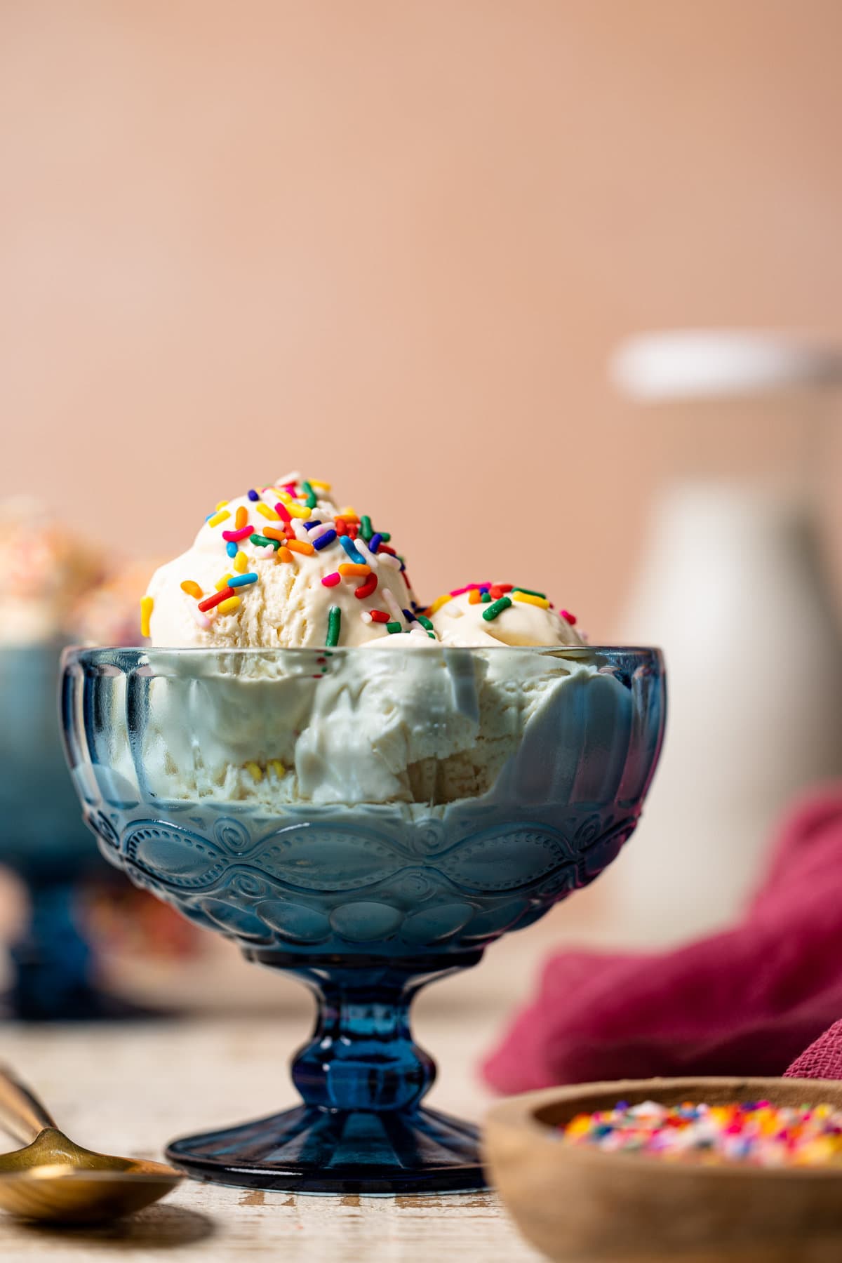 Fancy, blue bowl of No-Churn Vanilla Ice Cream.