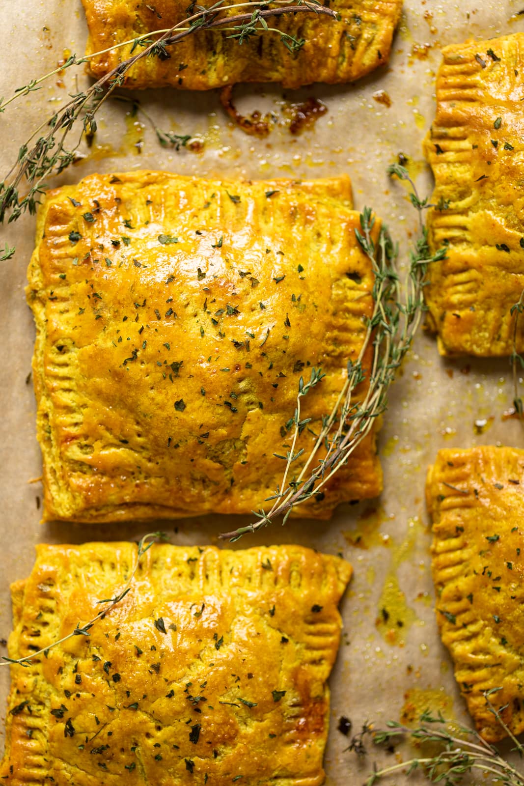 Closeup of Spicy Jamaican Vegan Patties on parchment paper