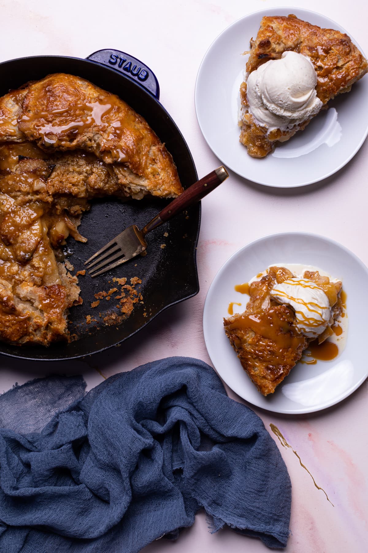 Pieces of Salted Caramel Apple Skillet Galette on small plates.