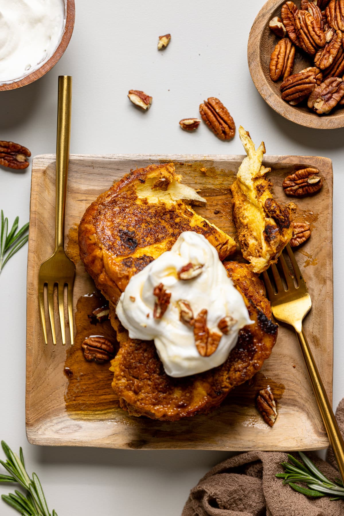 Pumpkin French Toast on a wooden plate with two forks