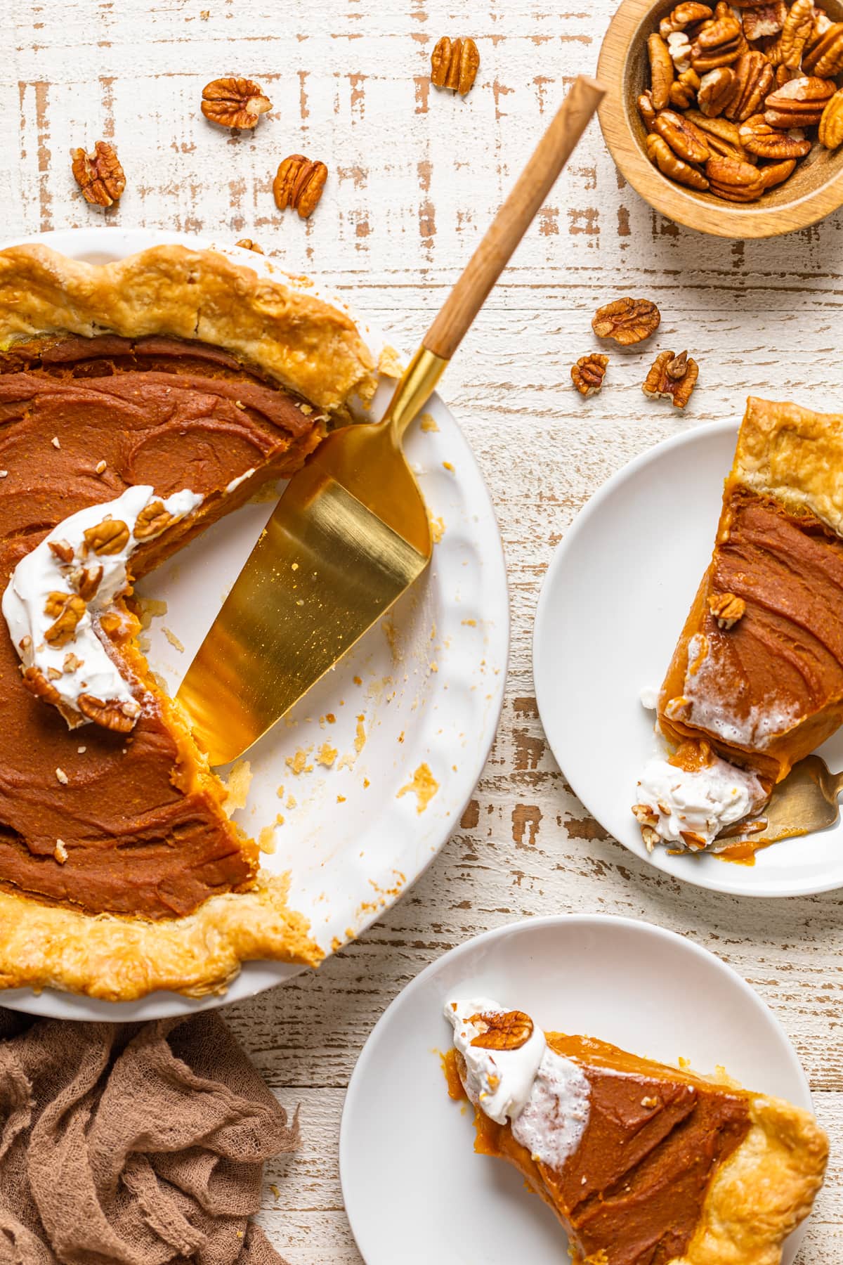 Slices of Vegan Pumpkin Pie on small plates.