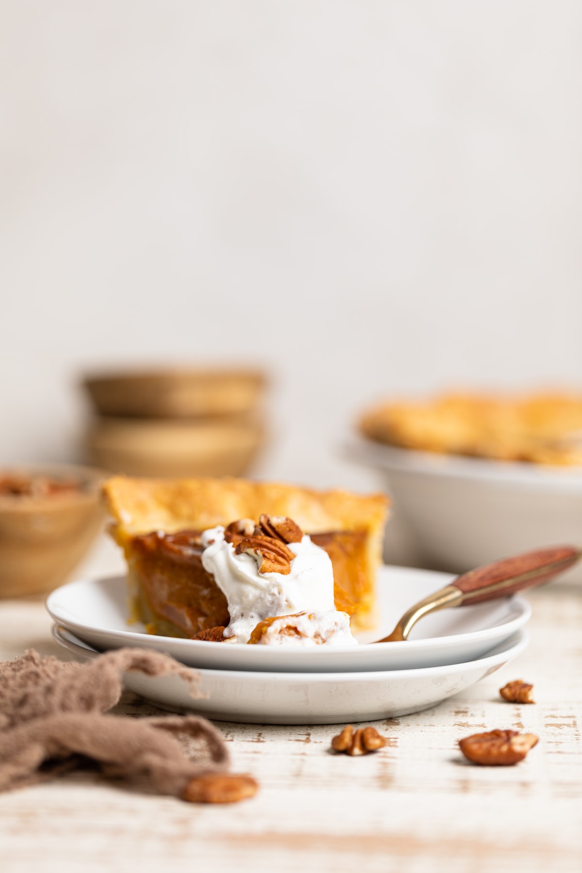 Slice of Vegan Pumpkin Pie on small plates.