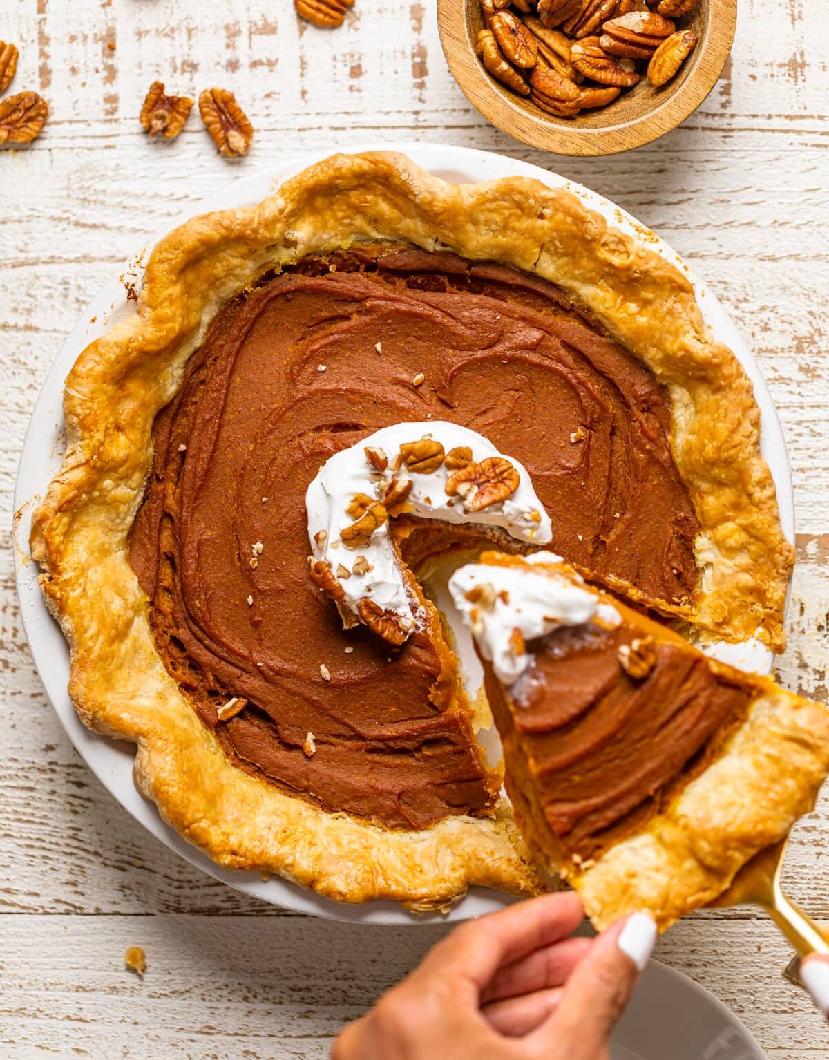 Slice being taken from a Vegan Pumpkin Pie