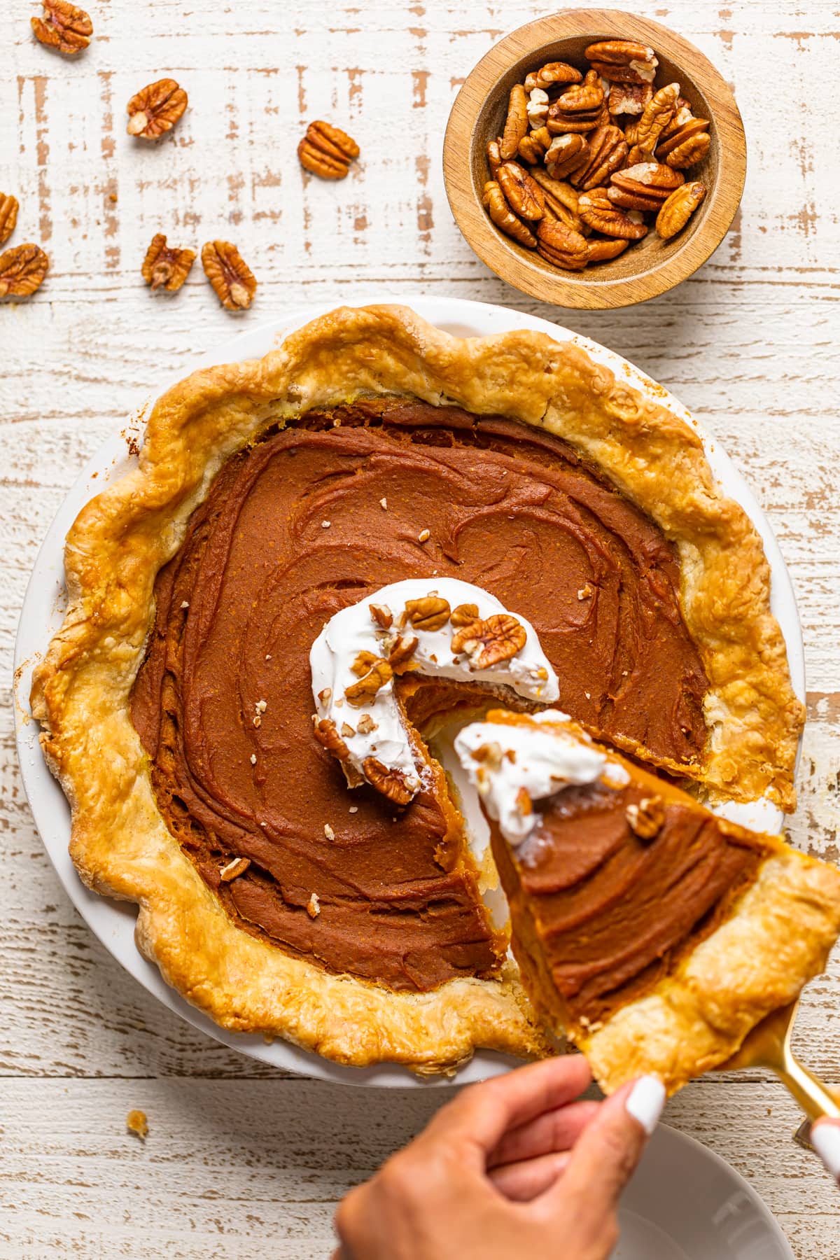 Slice being removed from a Vegan Pumpkin Pie.