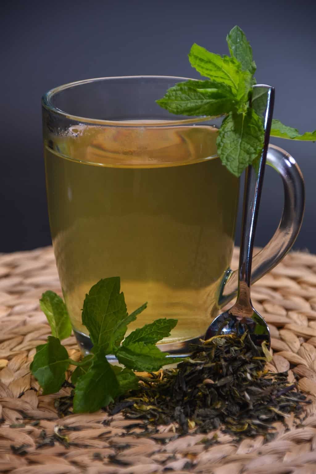 Glass mug of tea.