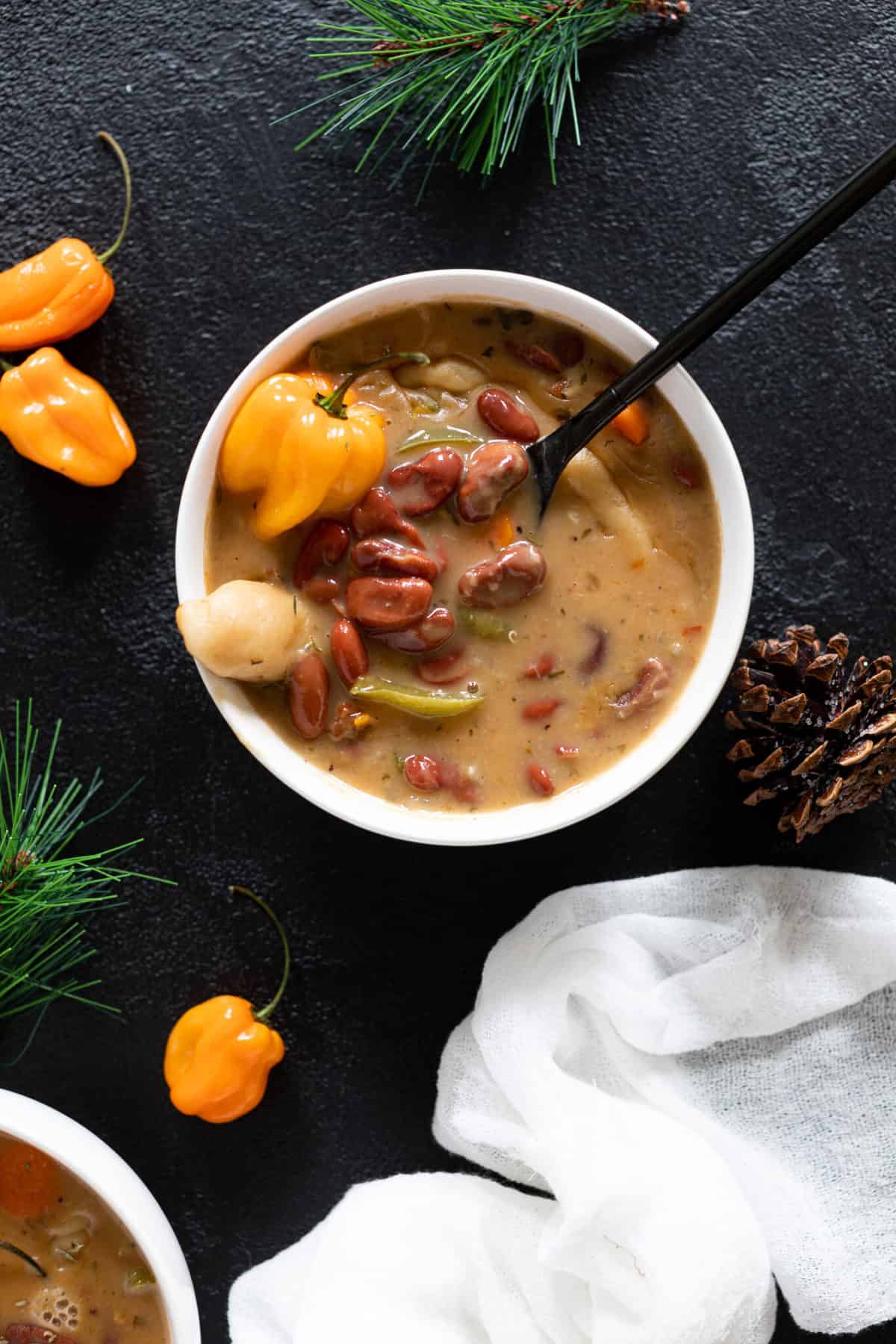 Spoon in a bowl of Spicy Vegan Jamaican Stew Peas